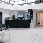 An empty waiting room inside of a private medical practice